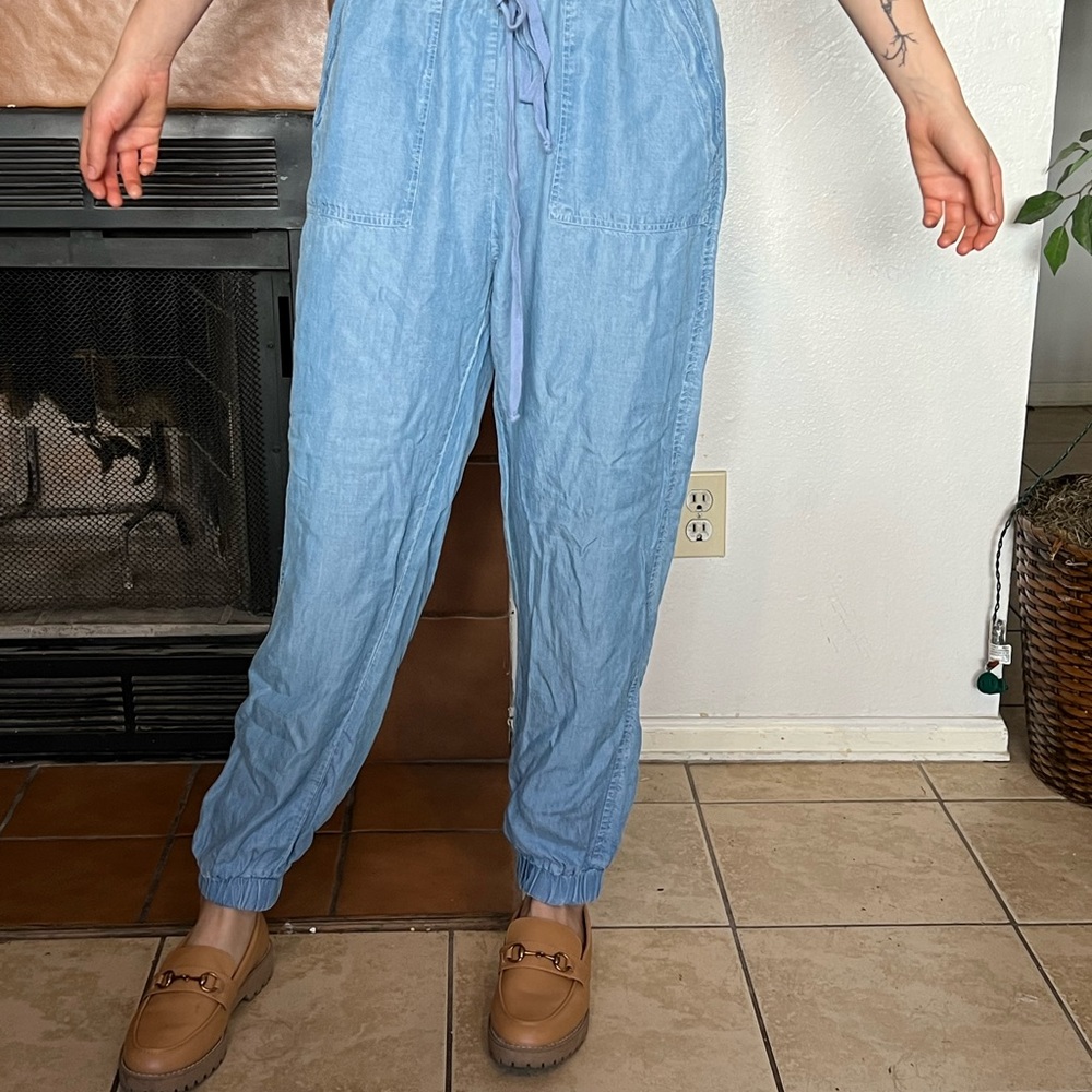High waisted flowy denim joggers with drawstring.